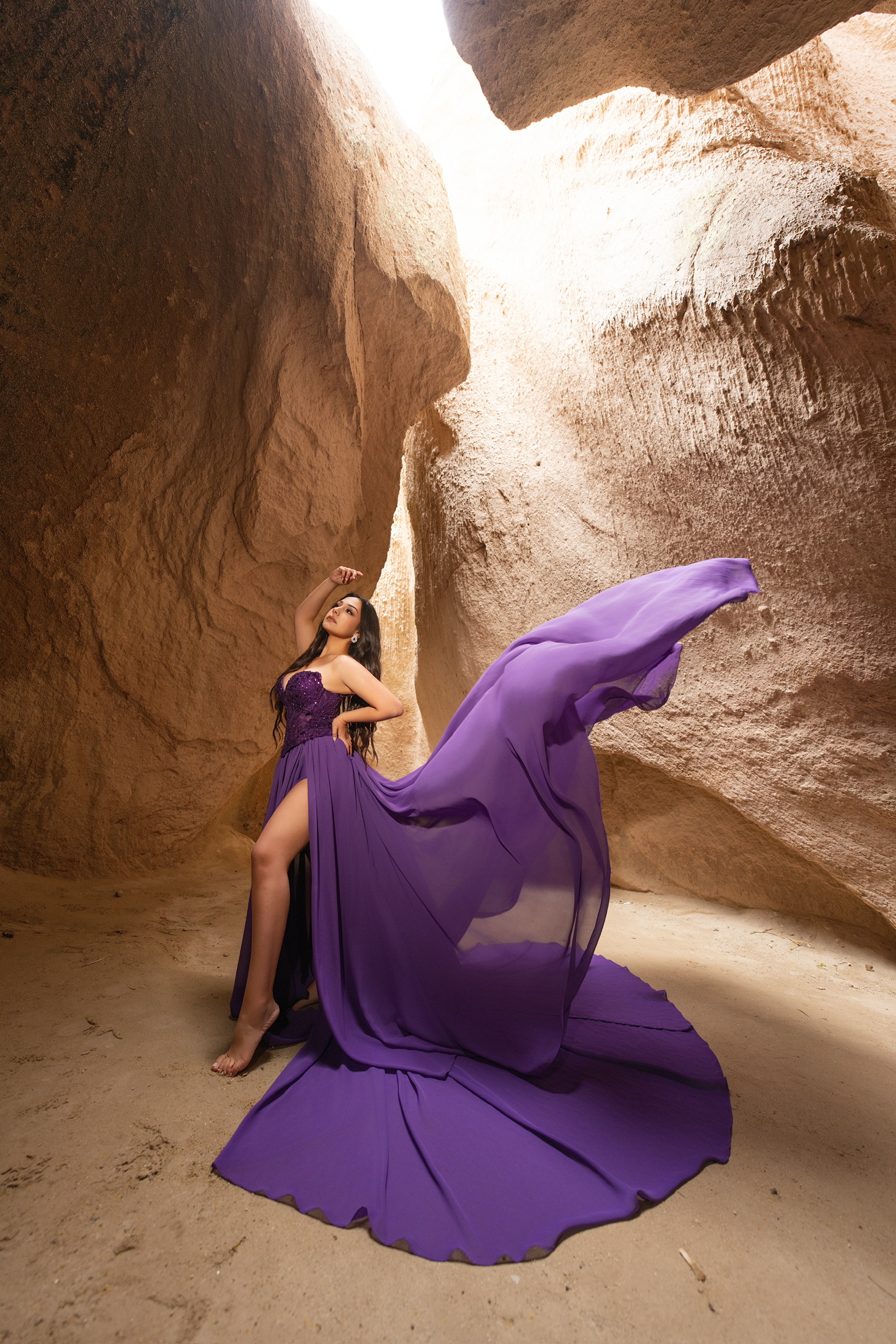 Model wearing a flowing purple Aqua Luna gown